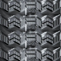 Close-up view of Zig-Zag tread pattern – reinforced rubber track design for superior grip in mud, snow, and uneven terrain.