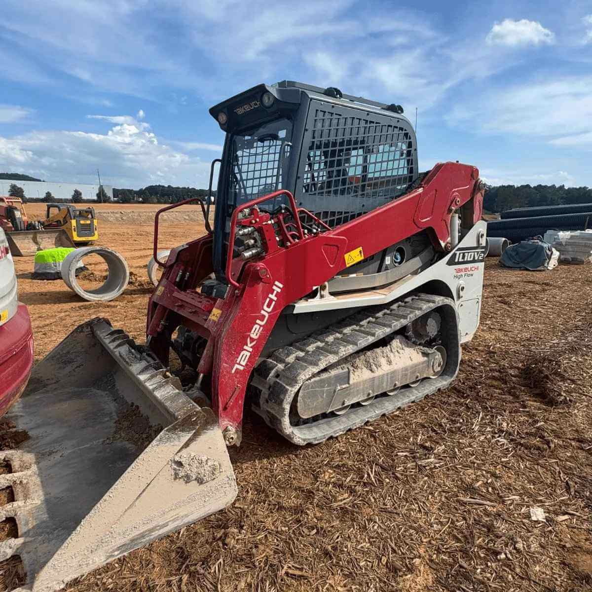 Takeuchi Rubber Tracks: TL Loaders vs TB Mini Excavators