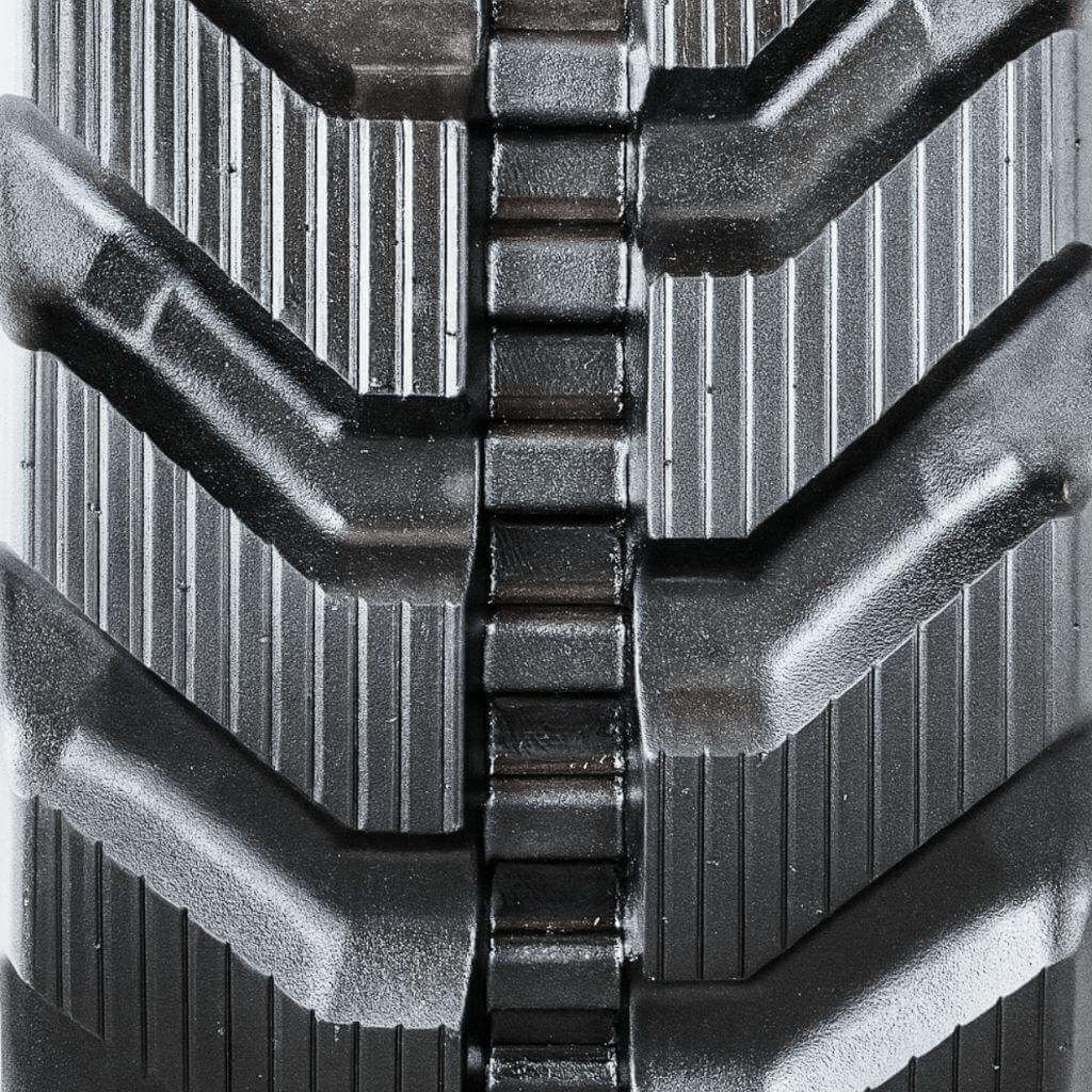 Close-up view of Wacker Tracks rubber track tread, showcasing superior traction and durability for jobsite performance.