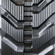 Close-up view of Wacker Tracks rubber track tread, showcasing superior traction and durability for jobsite performance.