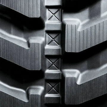 Takeuchi TB235-2 Rubber Tracks 350x52.5Wx86 Directional replacement rubber track for compact construction equipment detail.