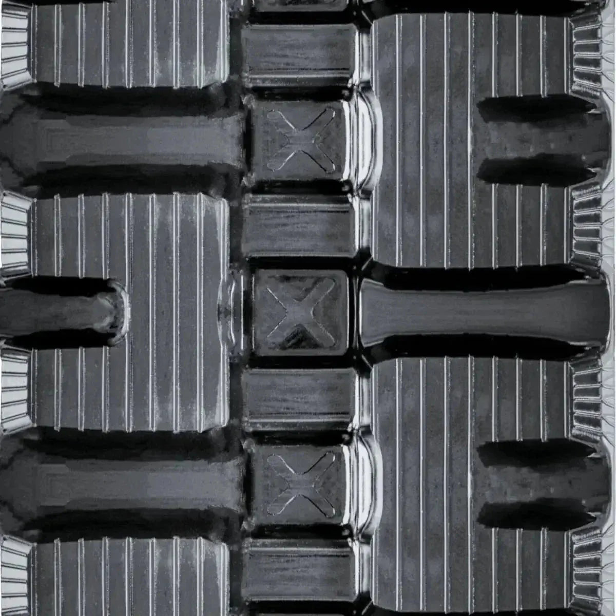 Bobcat T250 skid steer rubber track – C-Block tread close-up