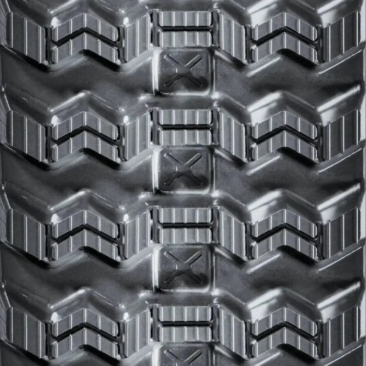 CAT 279C skid steer rubber track – Zig-Zag tread close-up