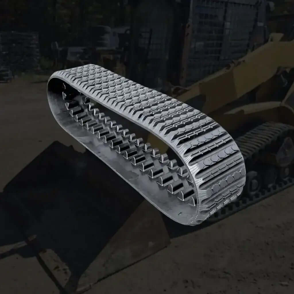 Heavy-duty rubber multi bar track for skid steer loader on construction site background