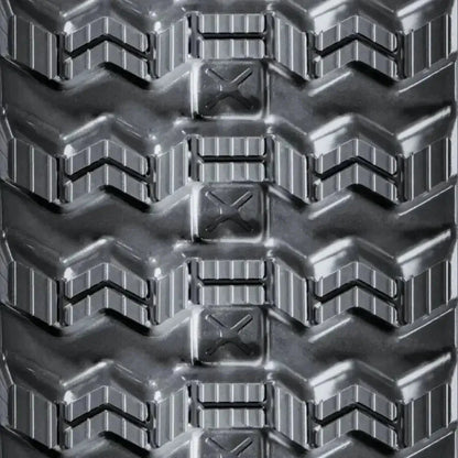 Takeuchi TL140 skid steer rubber track – C-Block tread close-up