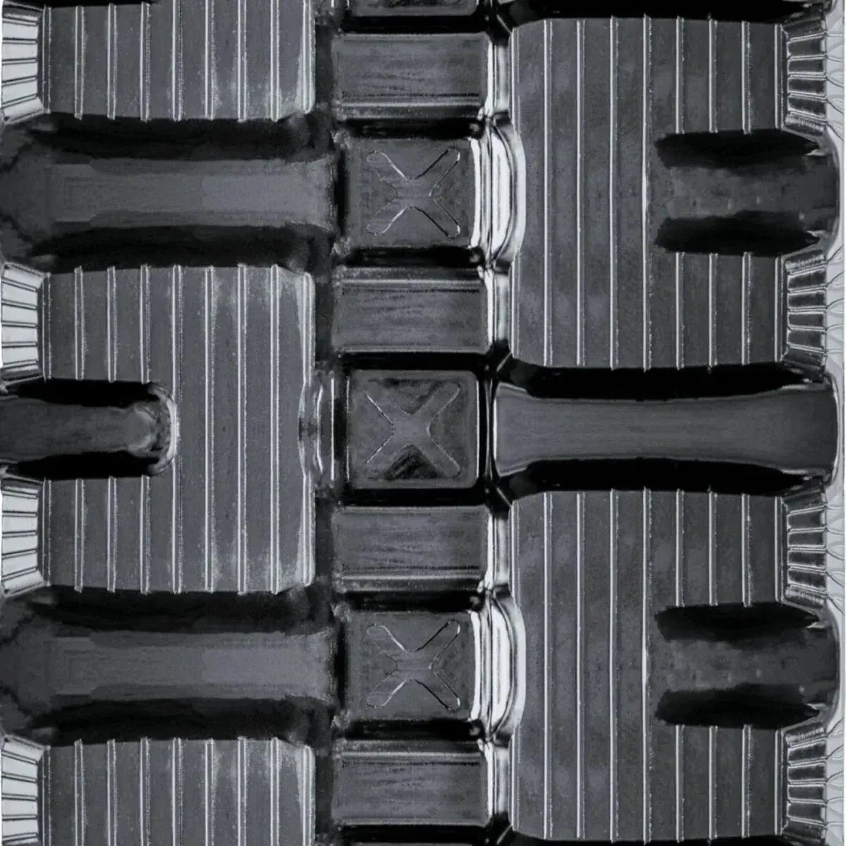 Takeuchi TL8 skid steer rubber track – C-Block tread close-up
