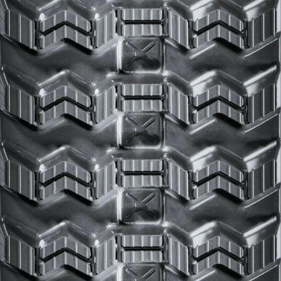 Zig-Zag rubber track tread pattern close-up