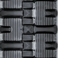 Close-up of C-Block tread rubber track – aggressive pattern built for durability, stability, and heavy-duty jobsite traction.