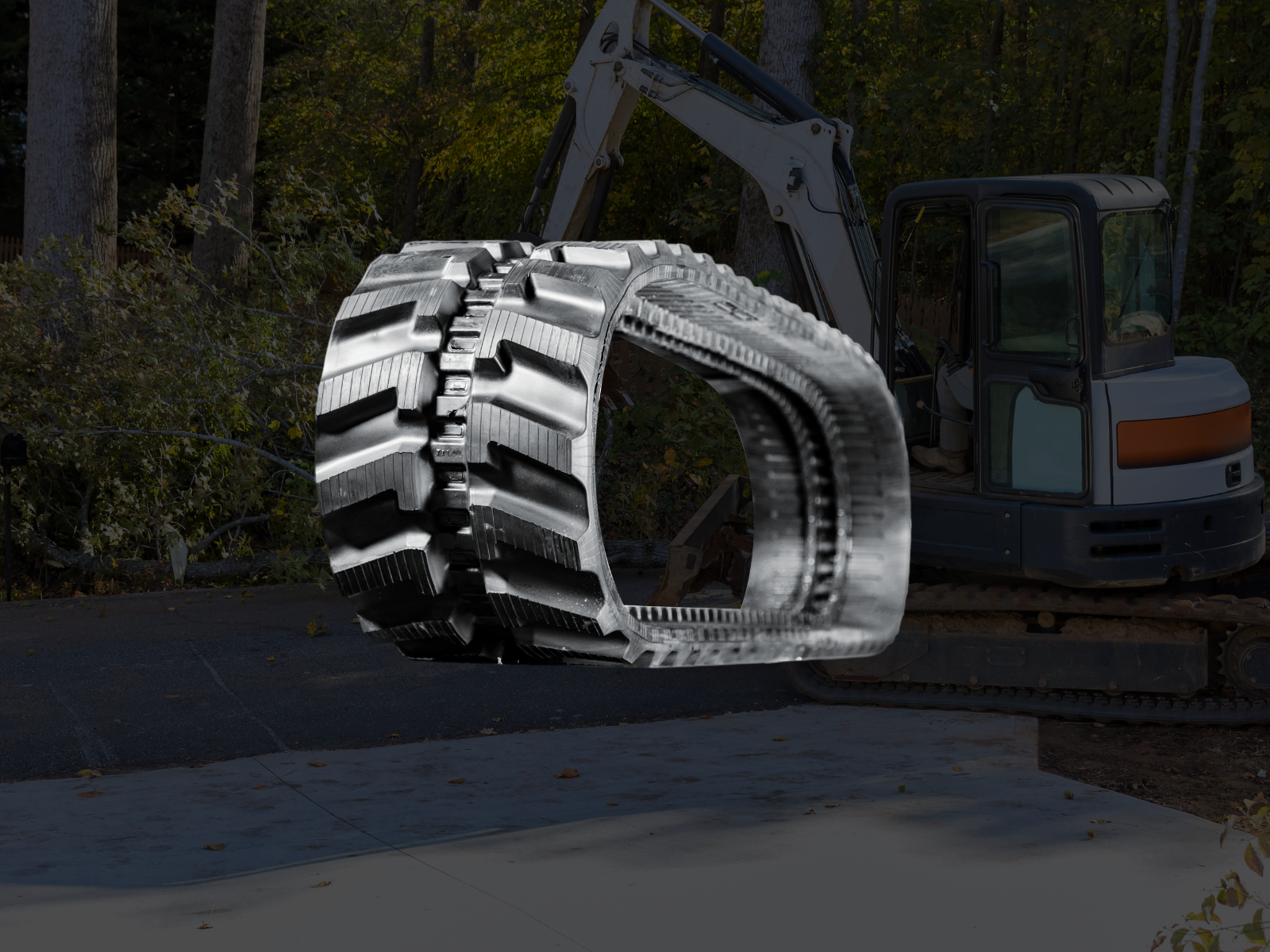 Bobcat mini excavator with heavy-duty replacement rubber tracks — OEM fitment