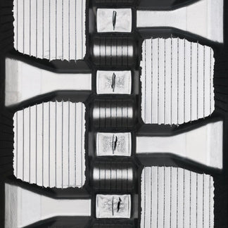 Bridgestone 320x86Bx50 Staggered Block rubber track — tread detail
