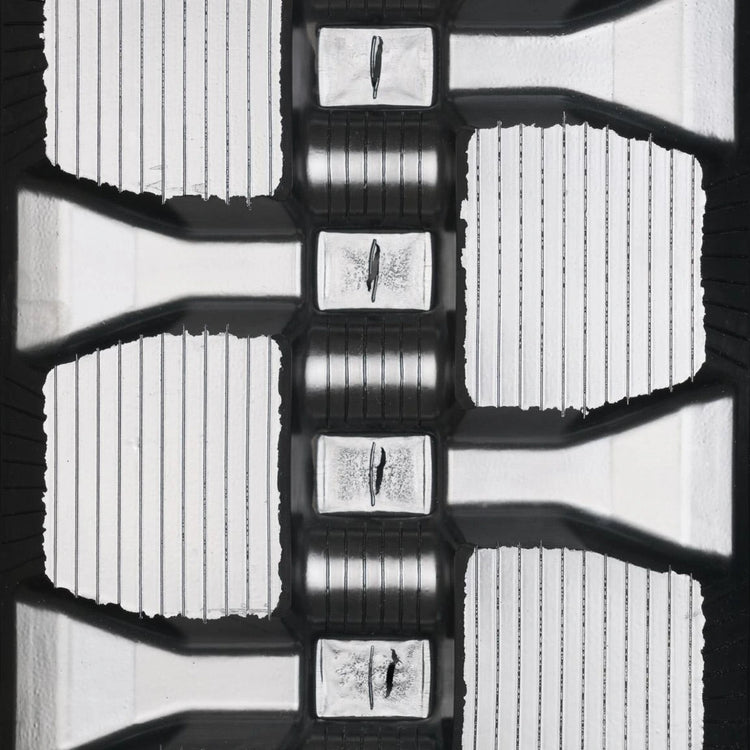 Bridgestone 320x86Bx52 Staggered Block rubber track — tread detail
