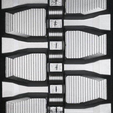 Bridgestone 450x86Bx58 Staggered Block rubber track — tread detail