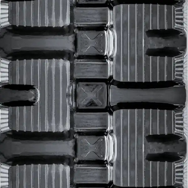 C-block tread rubber track closeup - all-terrain durability