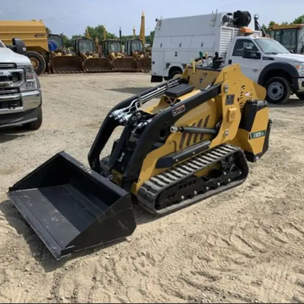 Compact track loader operating on durable rubber tracks for construction and material handling