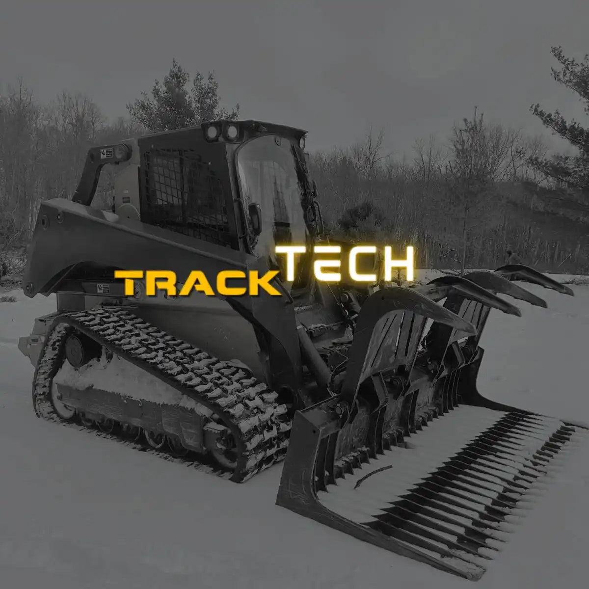 John Deere skid steer with new heavy-duty rubber tracks for optimal traction in snowy conditions.