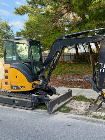 John Deere 35G excavator with TrackTECH 300x52.5Nx86 tracks — outdoor install (user tag 35G; badge may read 35P).