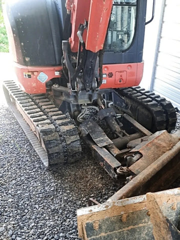Kubota KX040-4 mini excavator with TrackTECH 350x54.5Nx86 directional tracks — outdoor install.