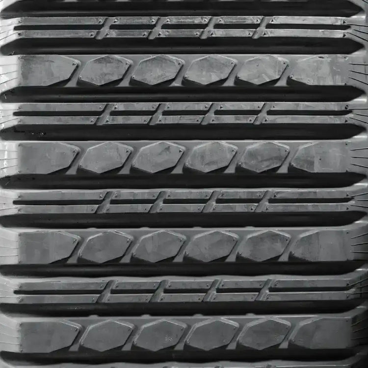 Multi-Bar tread surface – professional-grade skid steer track, overlapping bar design