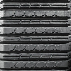 Multi-Bar tread close-up – OEM-spec skid steer track, turf-safe contact