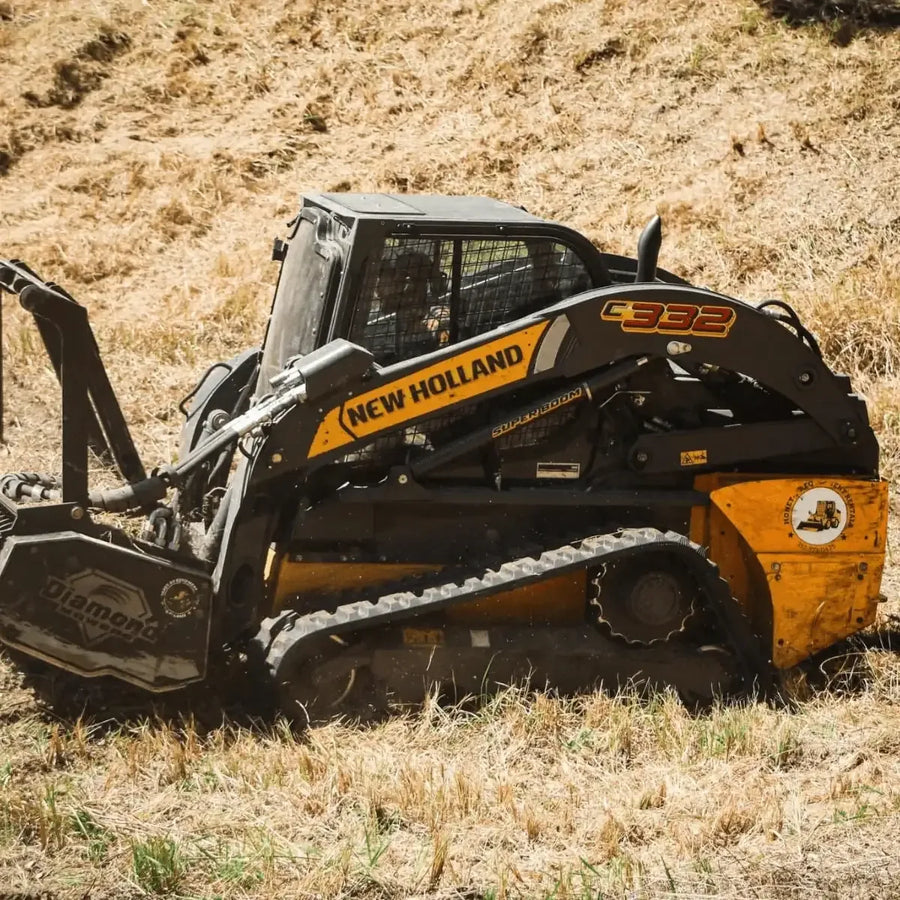 New Holland C332 rubber tracks - 450x86x55 C-Block tread - installed view
