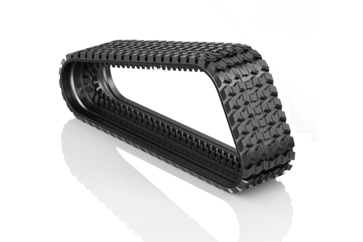 Zig-Zag tread compact track loader rubber track providing all-season traction on turf, mud, and snow