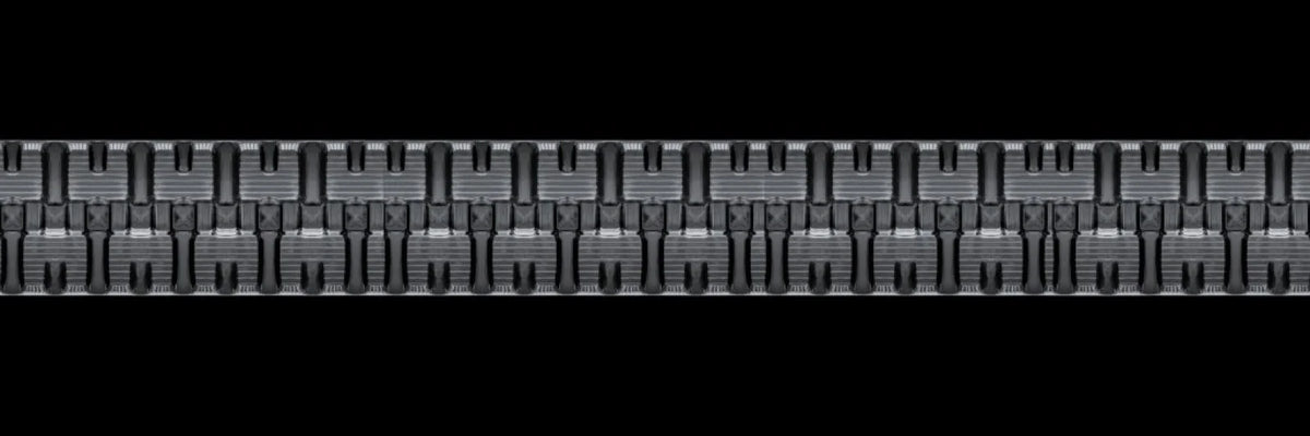 C-block rubber track tread close-up — shop rubber tracks by size | TrackTECH