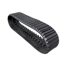 Black Terex ST50 rubber track, heavy-duty skid steer track with tread pattern on white background
