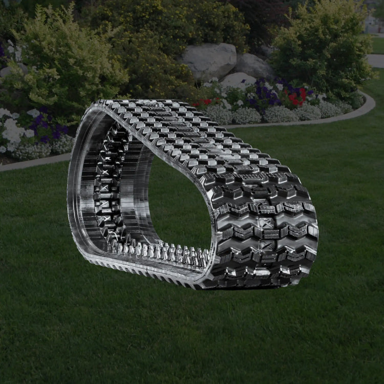 Zig-zag rubber track tread pattern engineered for enhanced traction, stability, and extended wear life