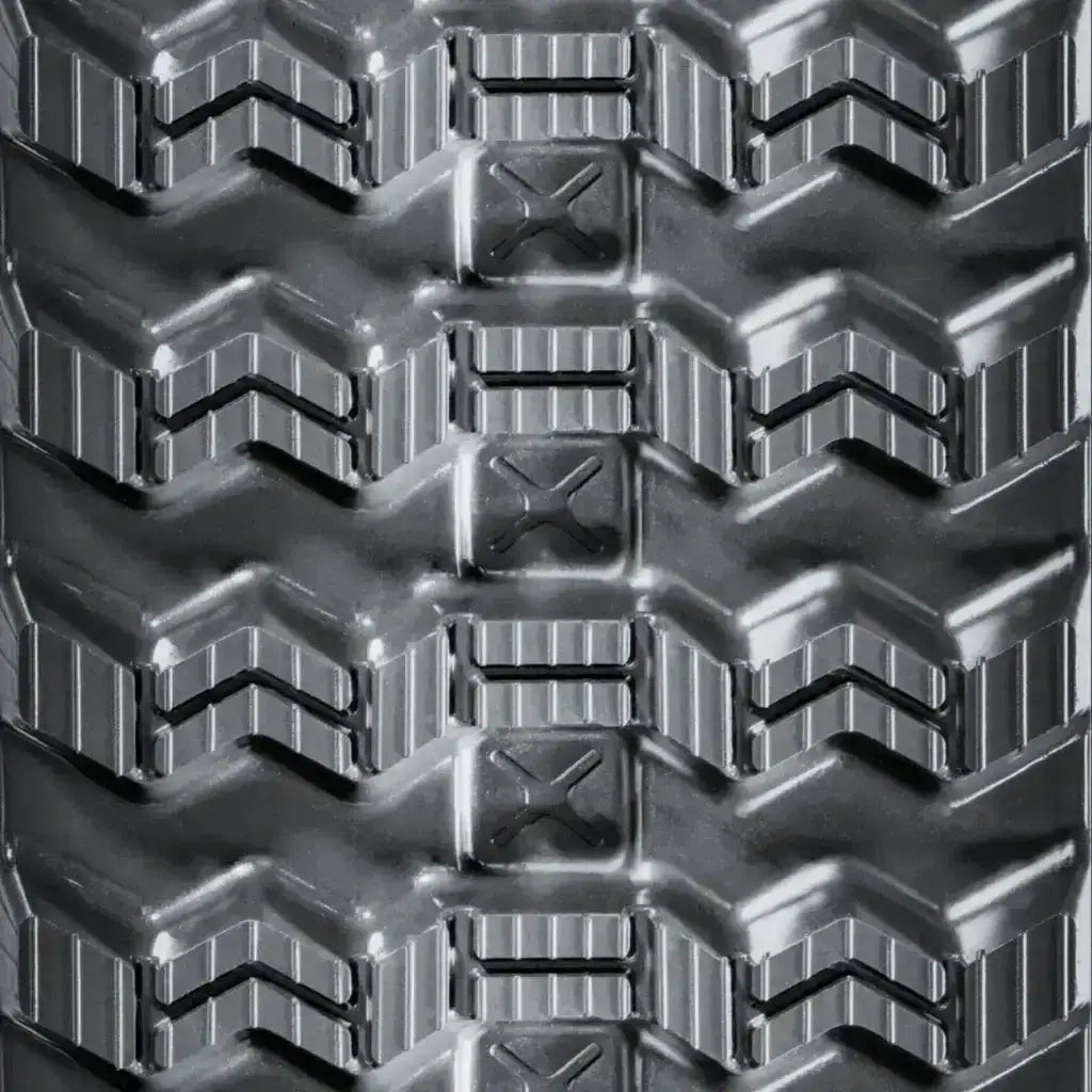 Volvo MCT135C rubber track 450x86x56 tread pattern close-up for enhanced grip and durability.
